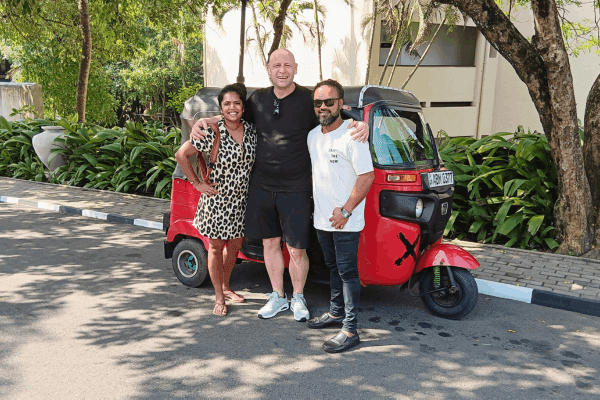 is sri lanka safe, yes this is happy couple with tuktuk owner who travel safely in sri lanka